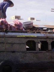 Can_Tho-Marche_flottant-Vendeur.JPG